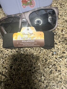 Foster Grant woman’s  Sunglasses – Gray Frame, Black Lenses